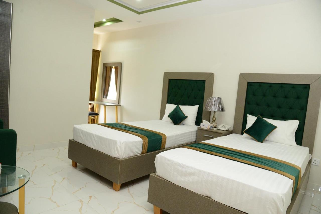 Hotel Deluxe Лахор Экстерьер фото