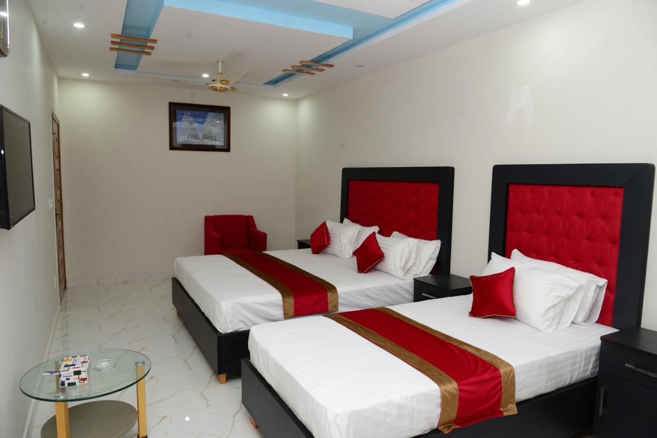 Hotel Deluxe Лахор Экстерьер фото