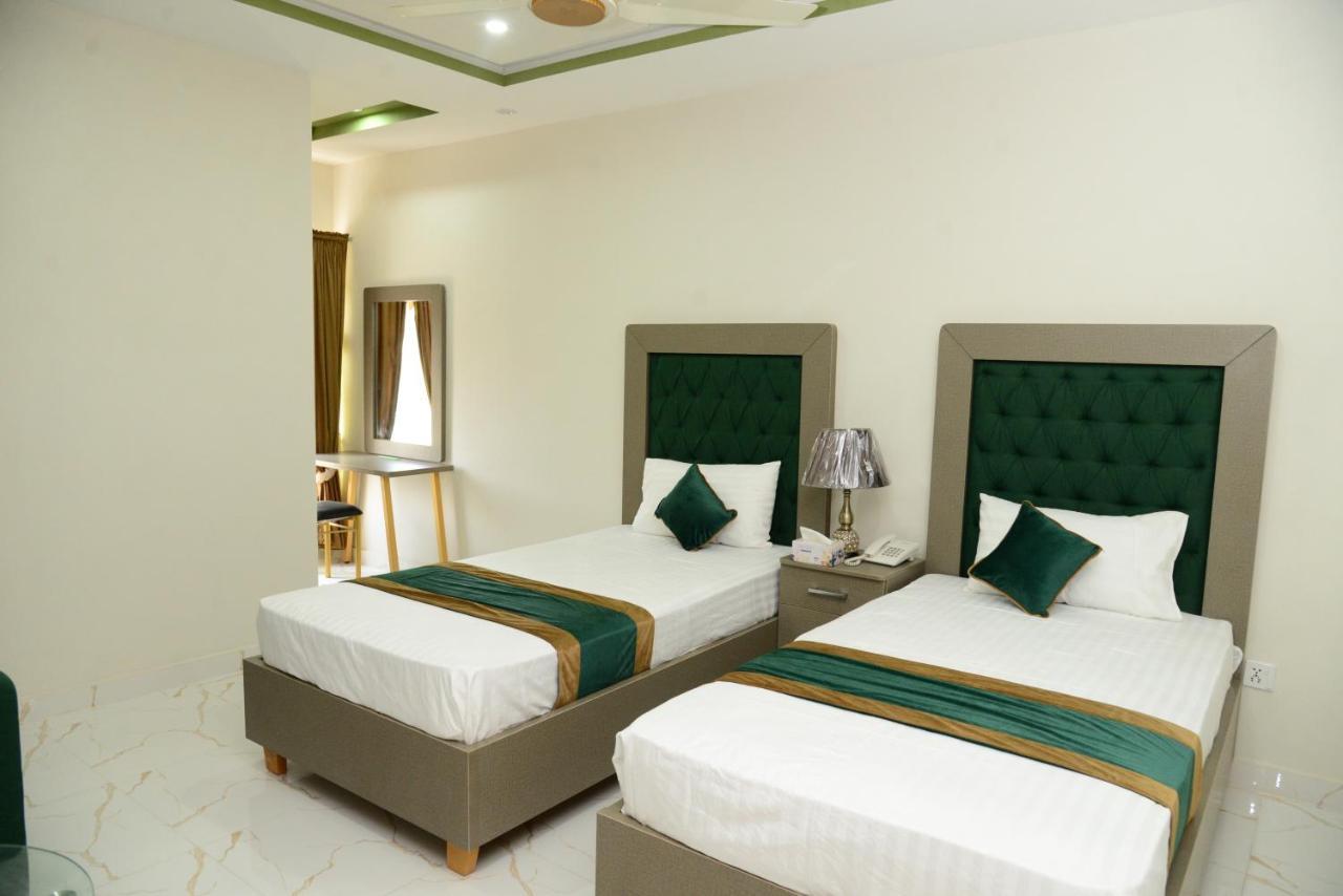 Hotel Deluxe Лахор Экстерьер фото