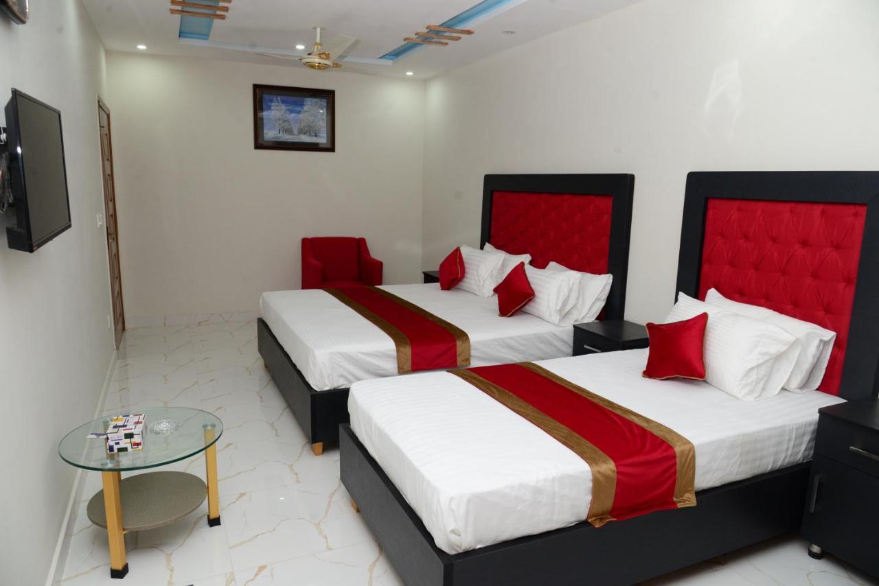 Hotel Deluxe Лахор Экстерьер фото